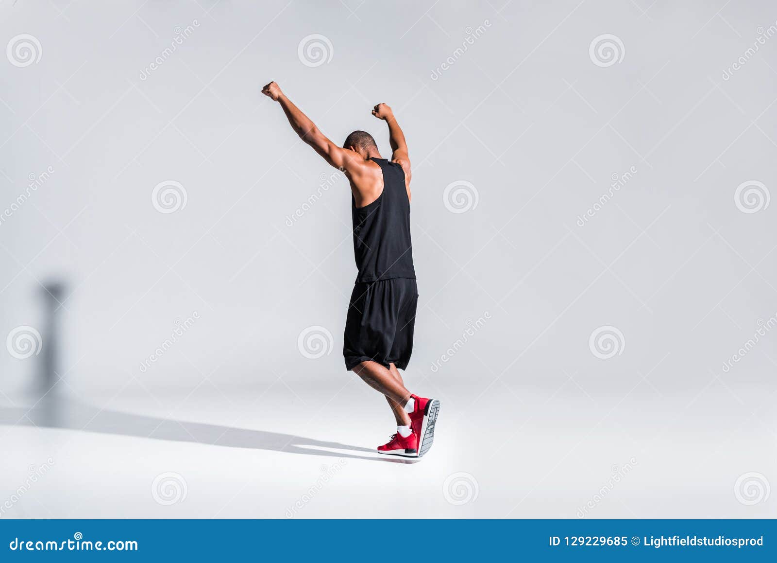 back view of young african american sportsman