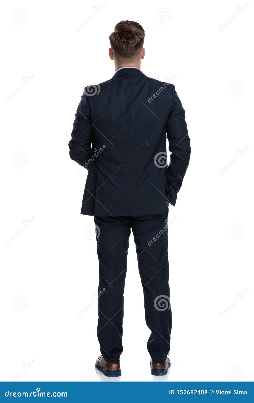 Back View Of A Young Businessman Wearing A Blue Suit Stock Photo ...