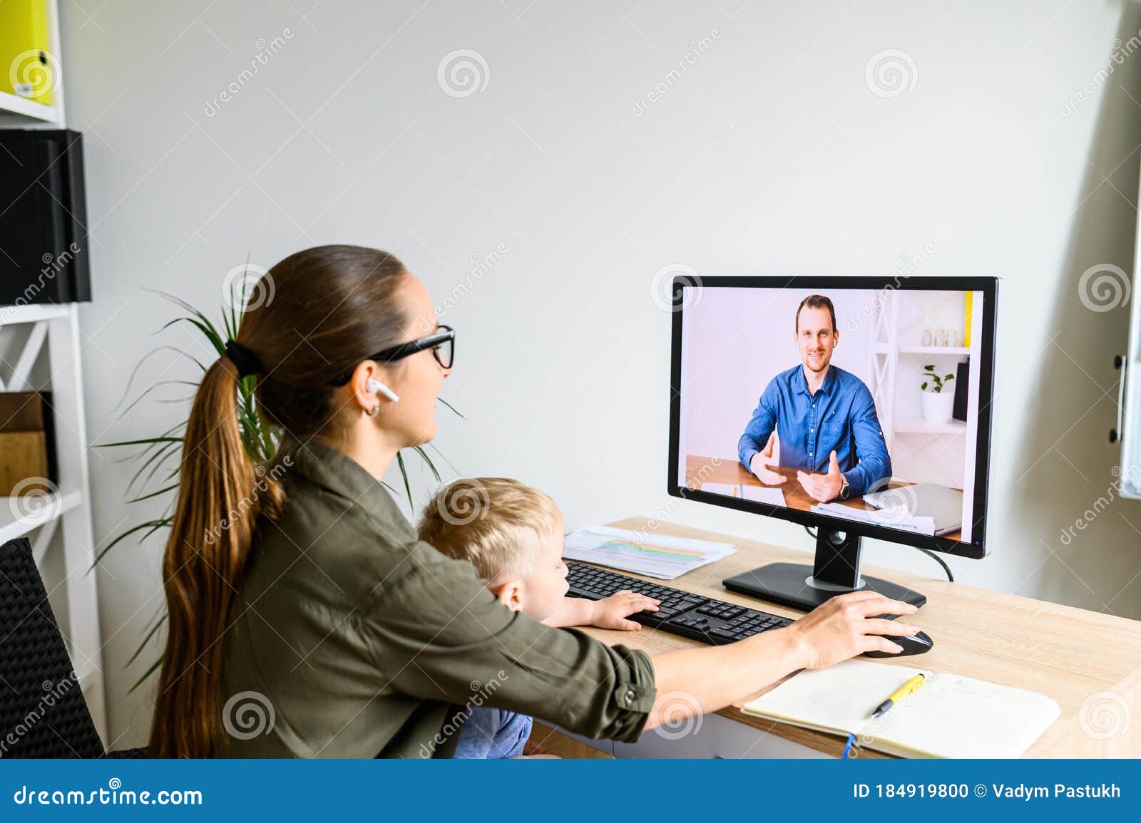 Mother Works in Home Office with Kid on Laps Stock Photo - Image of  holding, busy: 184919800