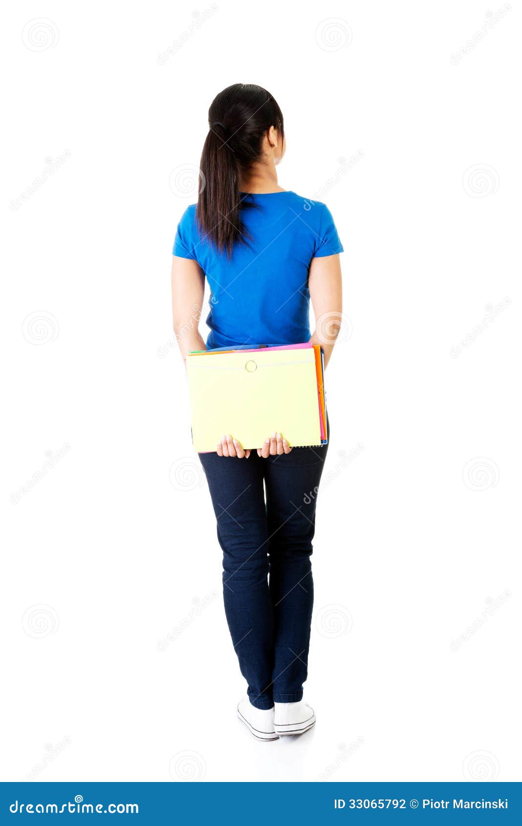 Back View Of Young Student Woman Holding A Notebook. Stock Photography