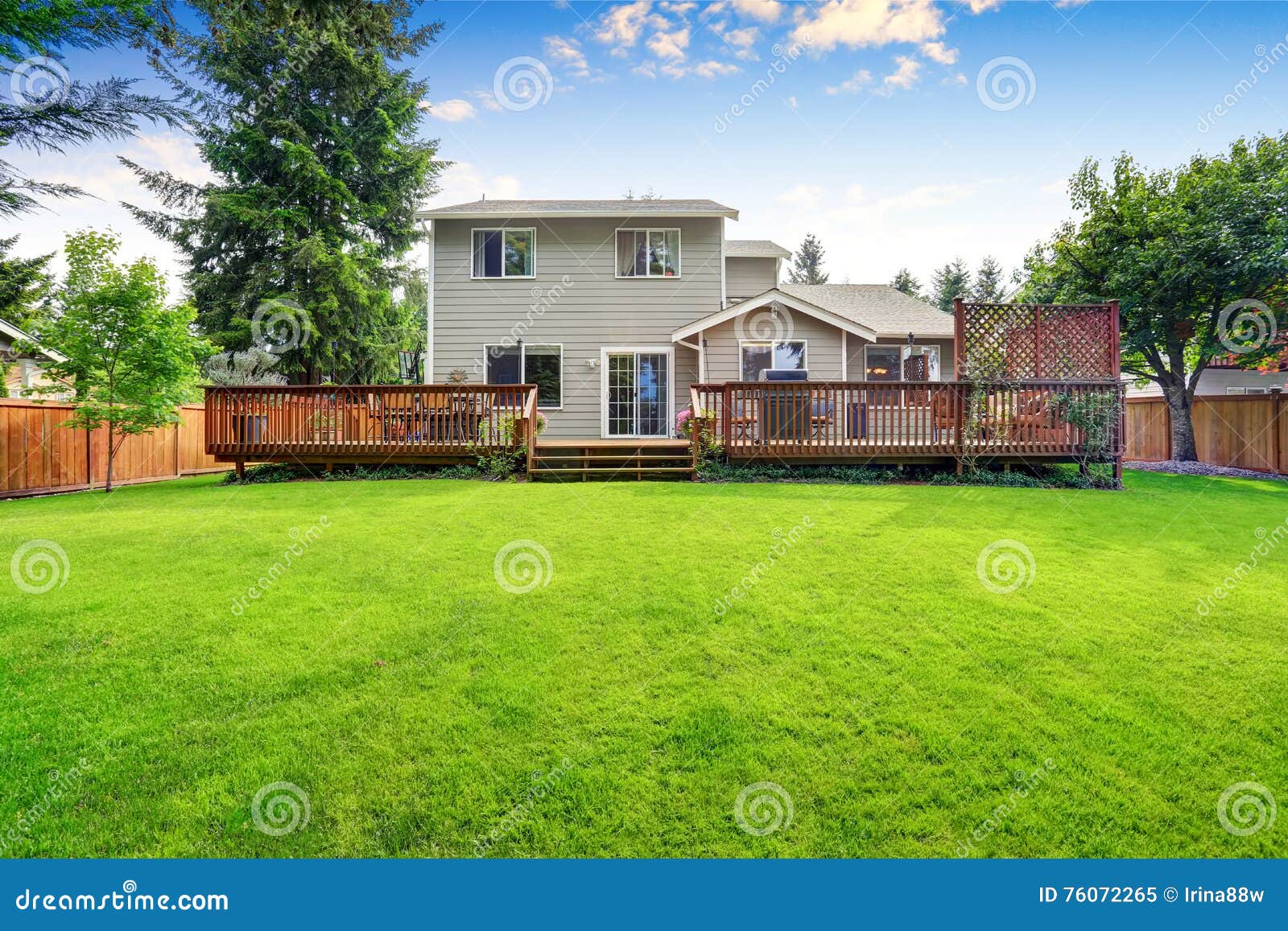 back yard house exterior with spacious wooden deck