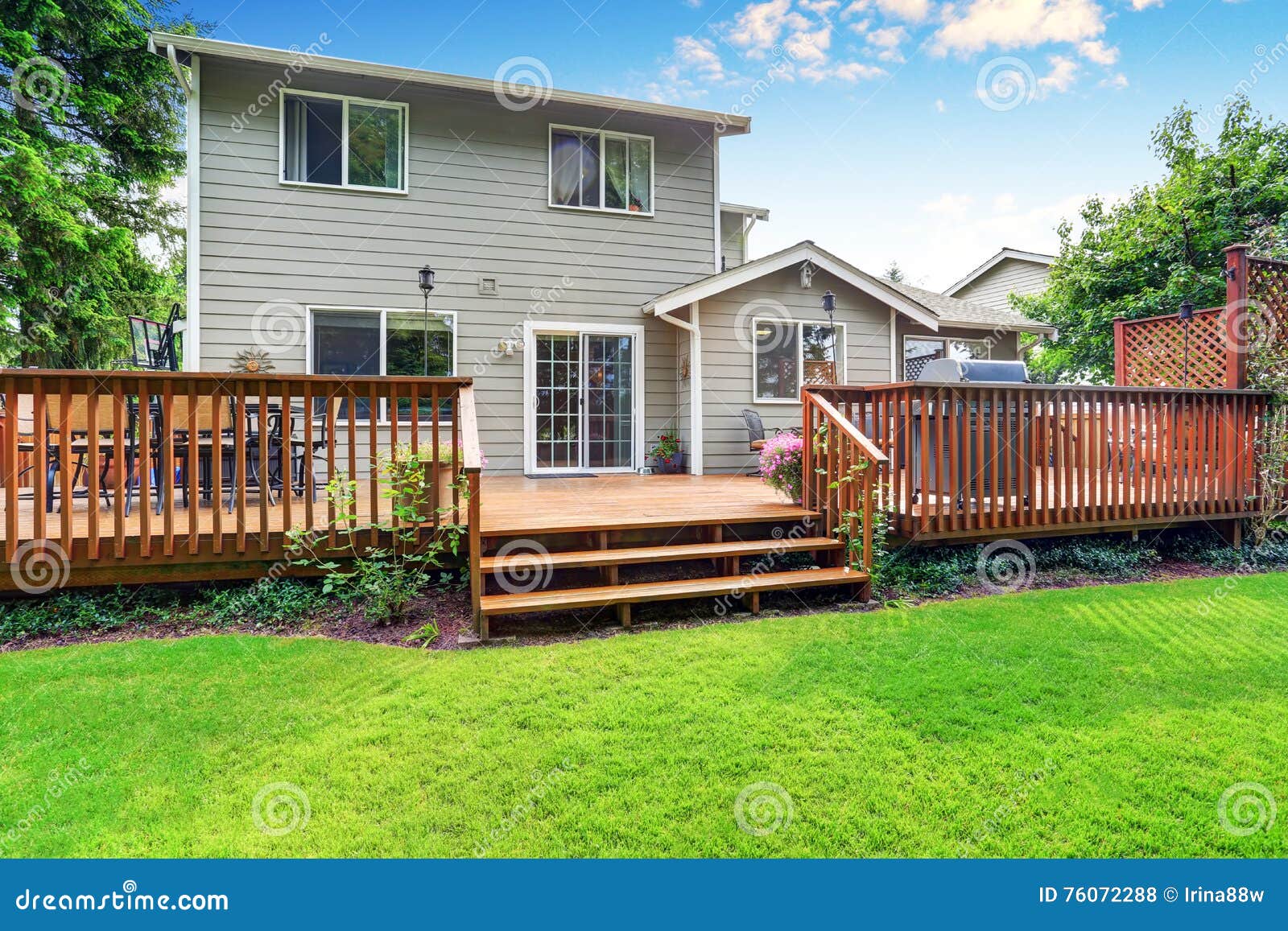 back yard house exterior with spacious wooden deck