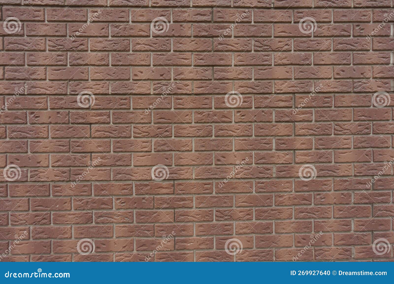 Background - Brown Brick Veneer Wall with Grey Mortar Joints Stock
