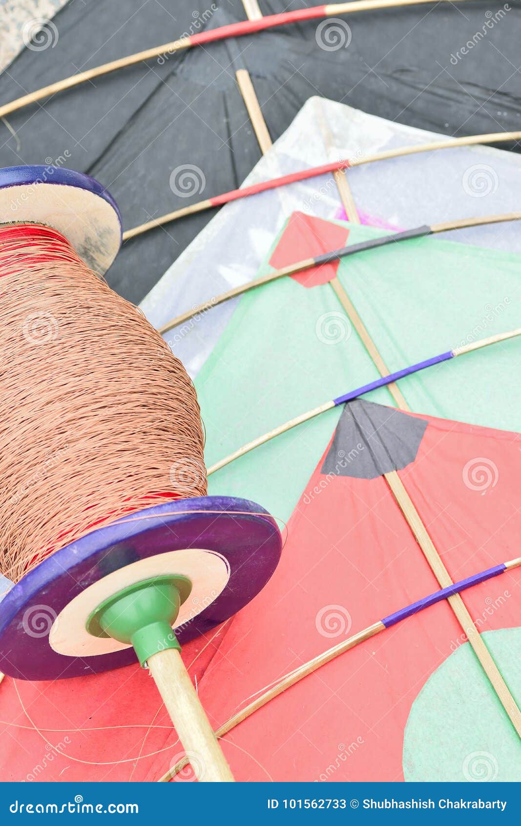 background of colorful indian kite with threads called manjha