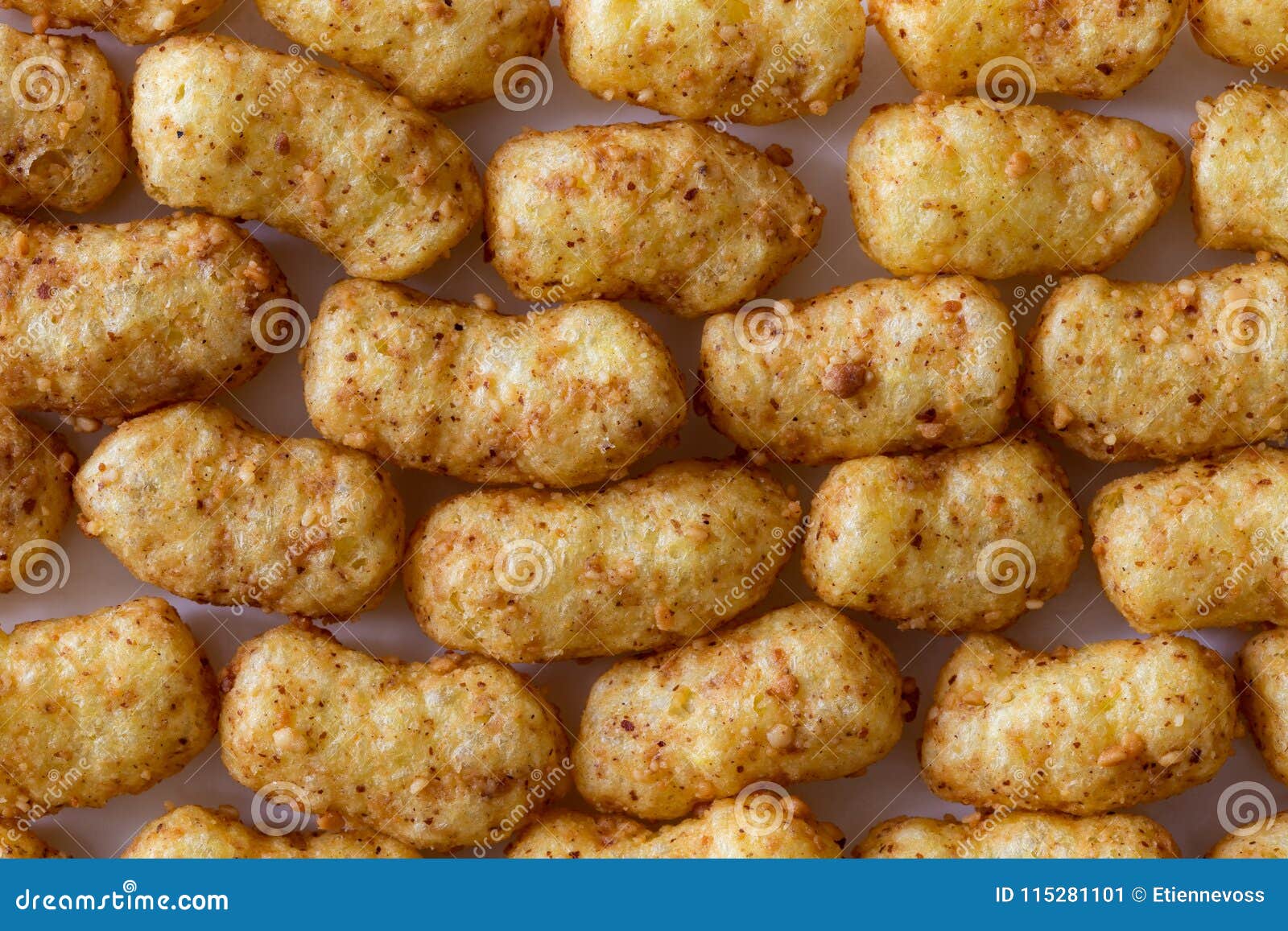 Background of Extruded Peanut Flips from Above. Stock Image Image of