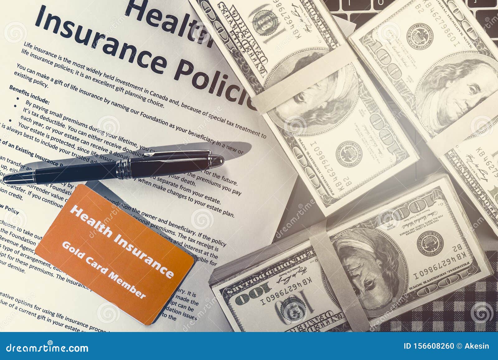Background Of Health Insurance Gold Card Member With Pen On Health Insurance Policy Document And ...