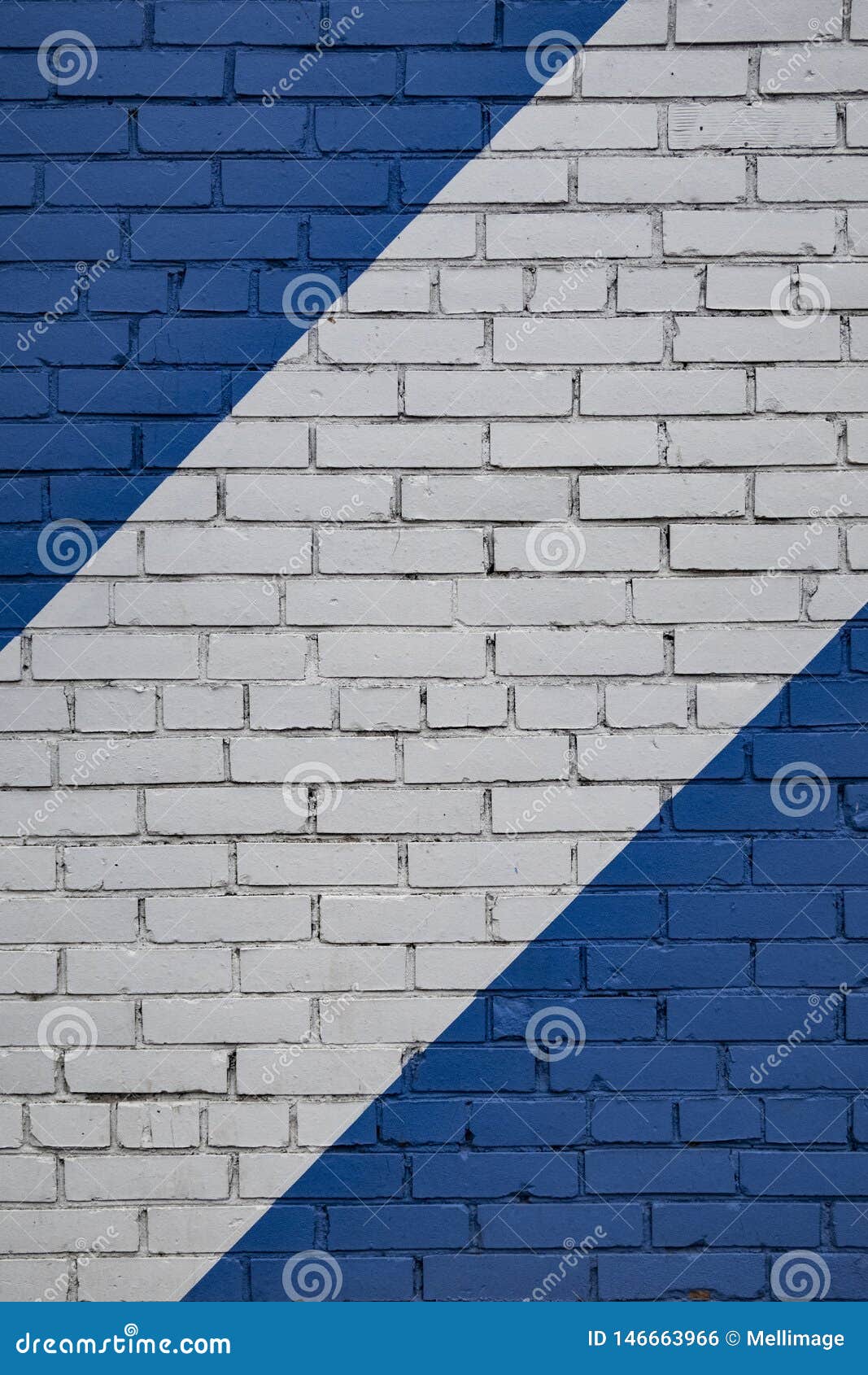 Background Diagonally Striped Blue and White Brick Wall Stock Photo