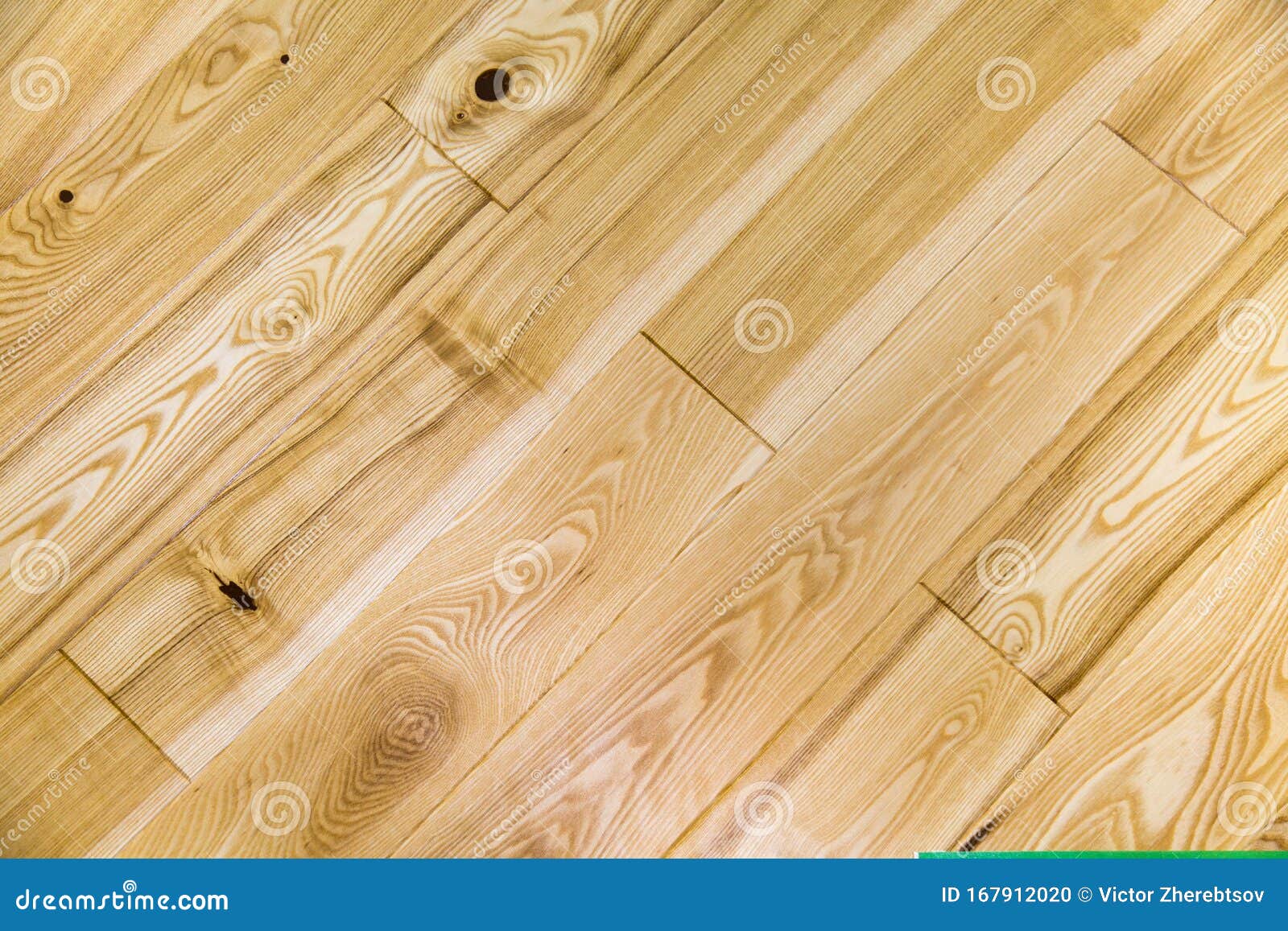 Background of Natural Ash Parquet Board with a Beautiful Pattern of