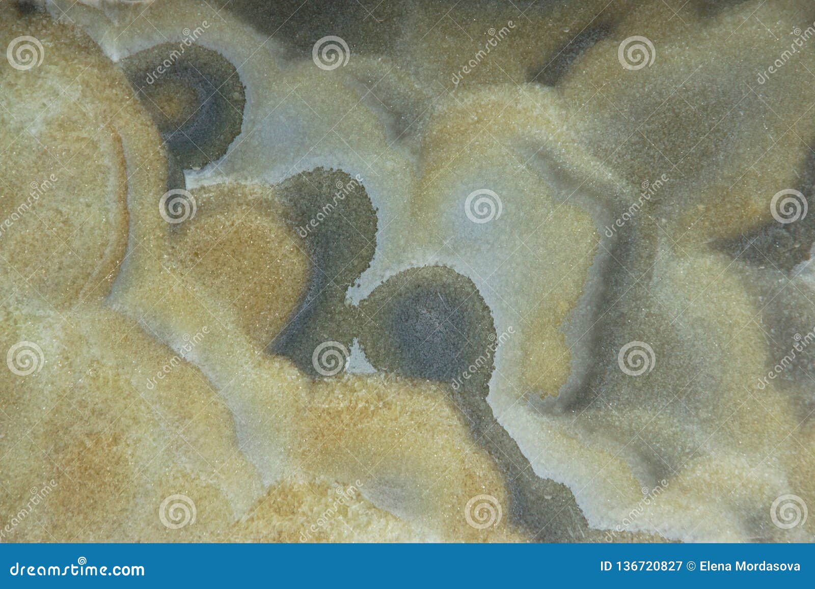 background from a natural stone onyx with bubbles and gray stains on the surface, onix naranja veteado