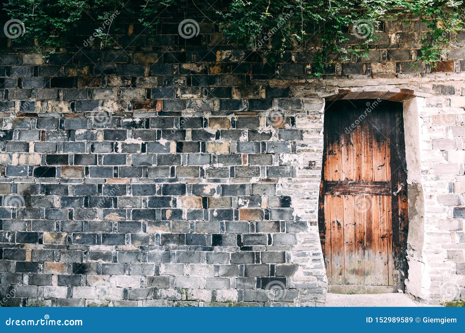Background of the Old Brick Walls Stacked in Layers with Copy Space and  Wooden Door or Can Use Wallpaper Stock Image - Image of light, background:  152989589