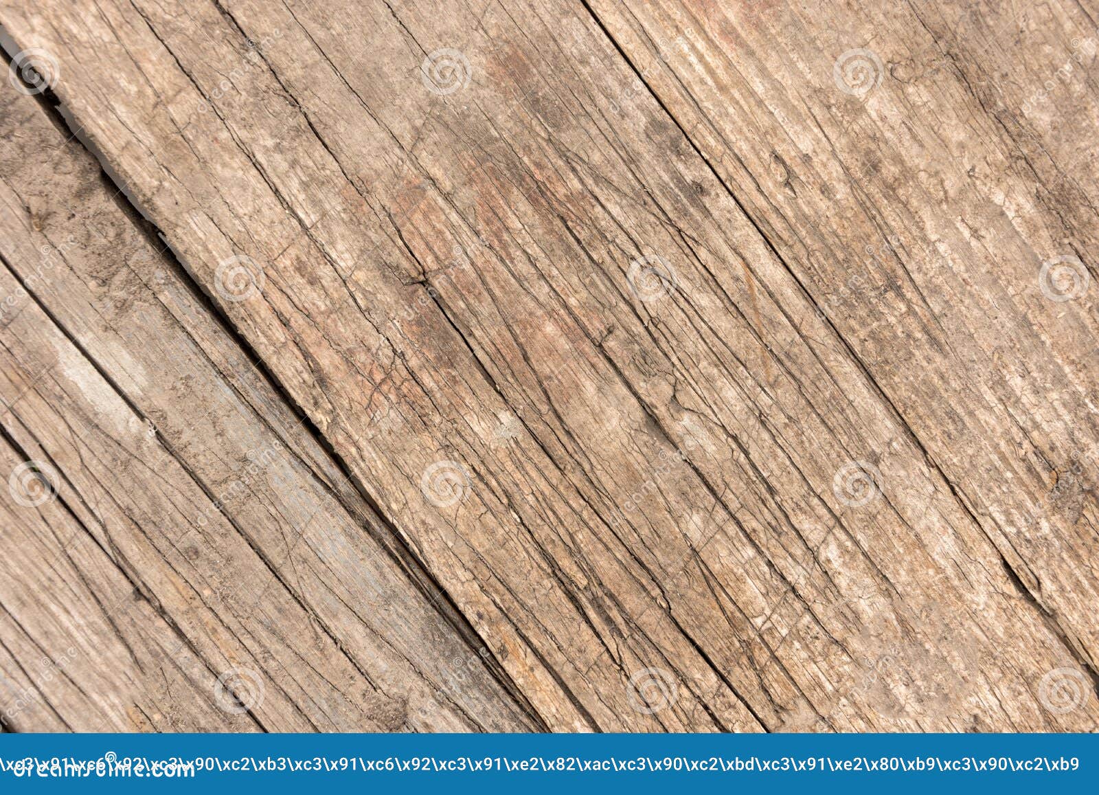 background of old scratched plank boards densely knocked together