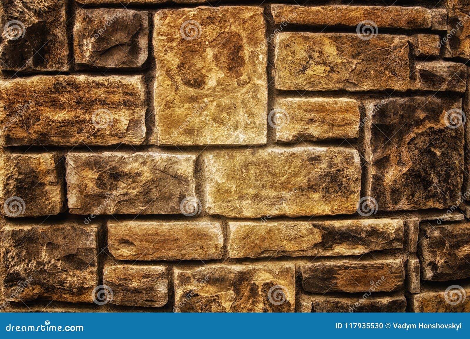 Background of a Stone Fence of Structural Stones, Light Brown Color