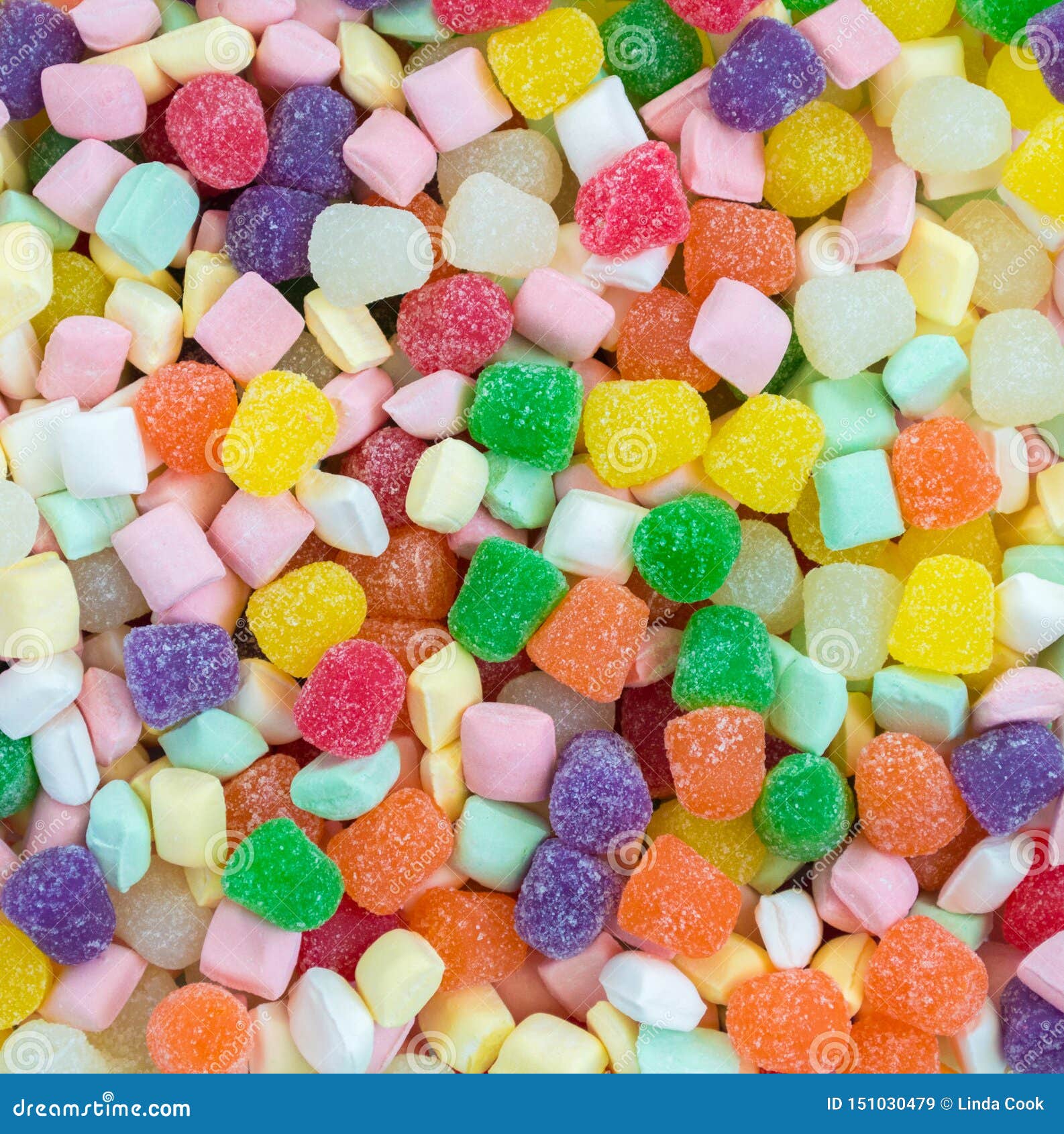 Background Texture Close Up of Pastel Butter Mints and Bright