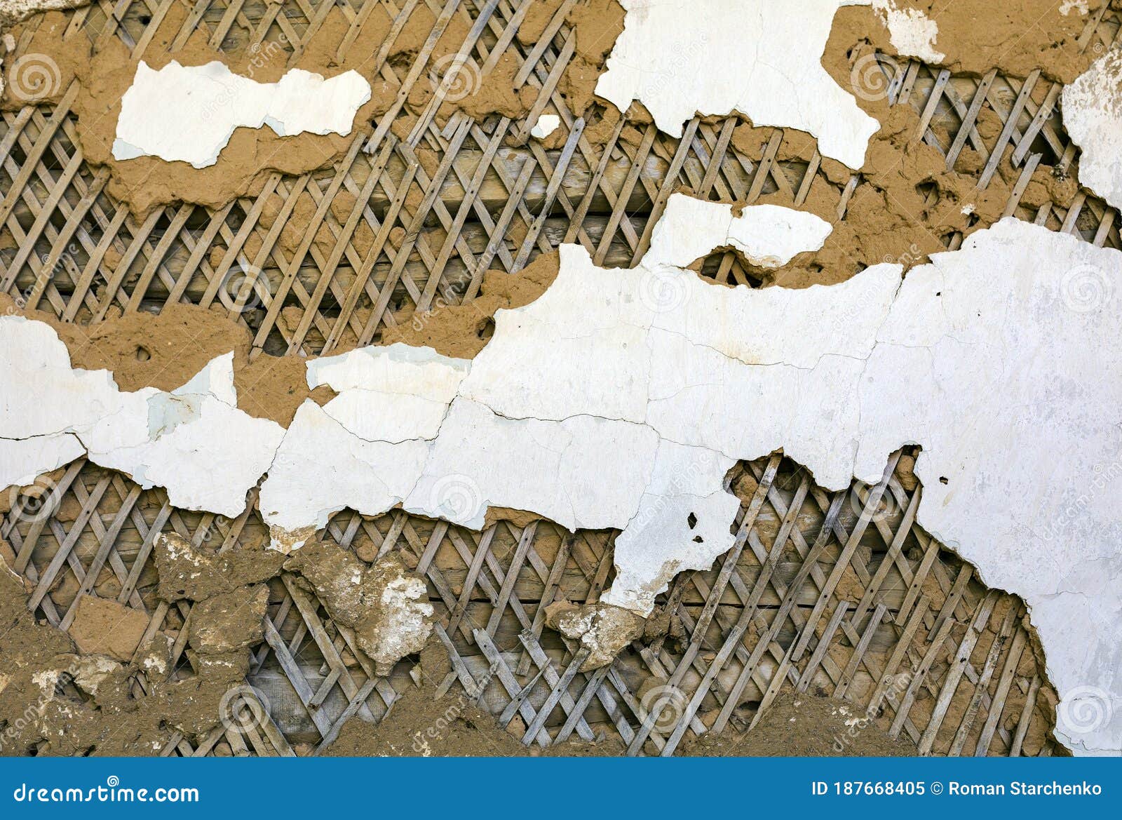 Background Texture of Old Plaster on the Wall with Remnants of White