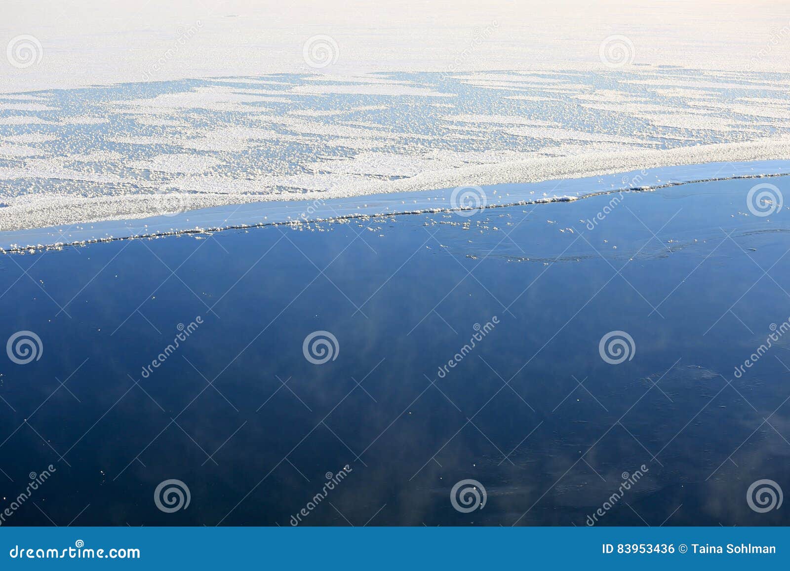 background of vaporizing, freezing blue sea