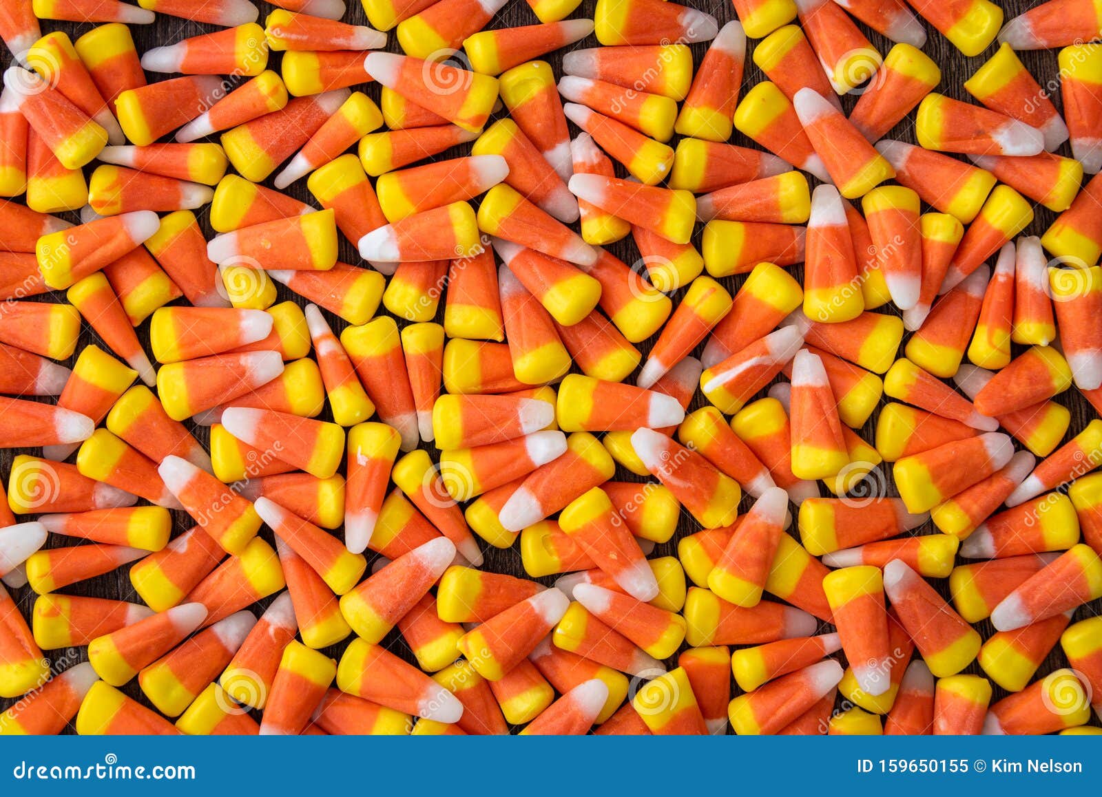 Background of Yellow, Orange, and White Candy Corn for the Holidays