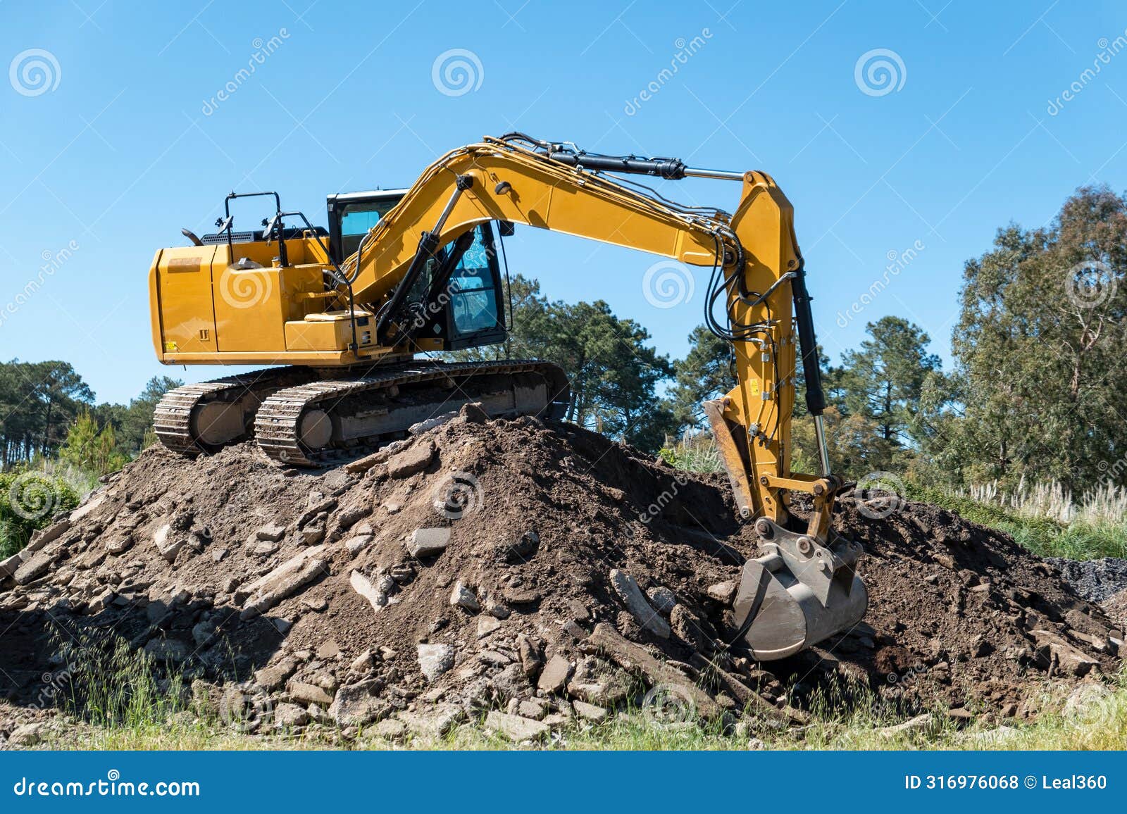 backhoe operation: moving gravel to the ccrusher