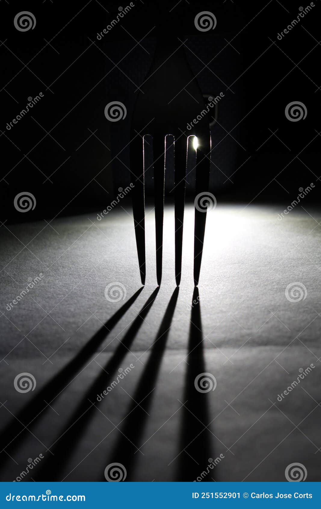 backlit teeth in shadow on the surface