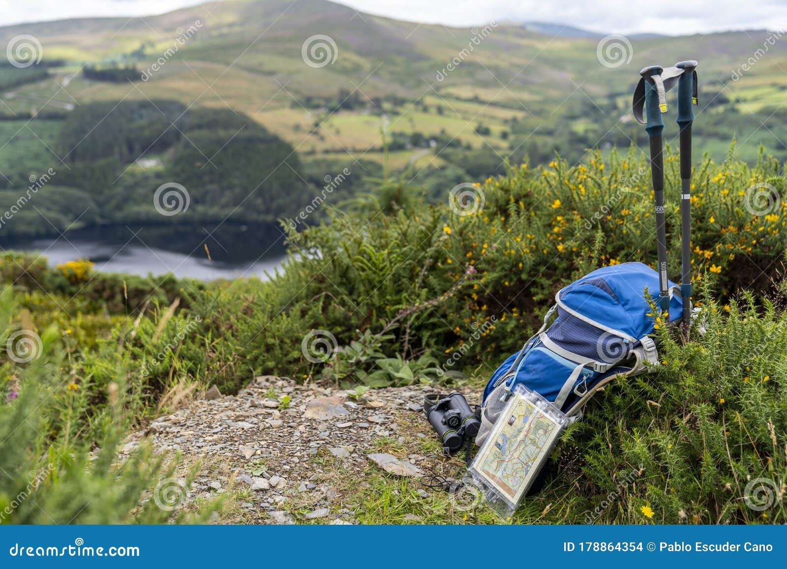 Backpack, Binoculars, Map and Sticks on the Mountain, Mountain