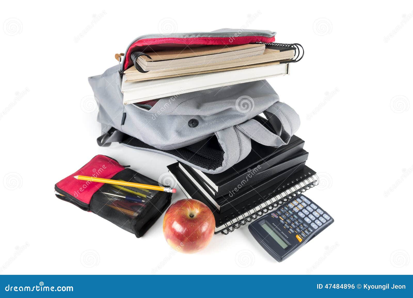 Backpack Full Of School Supplies. On White Background. Stock Photo