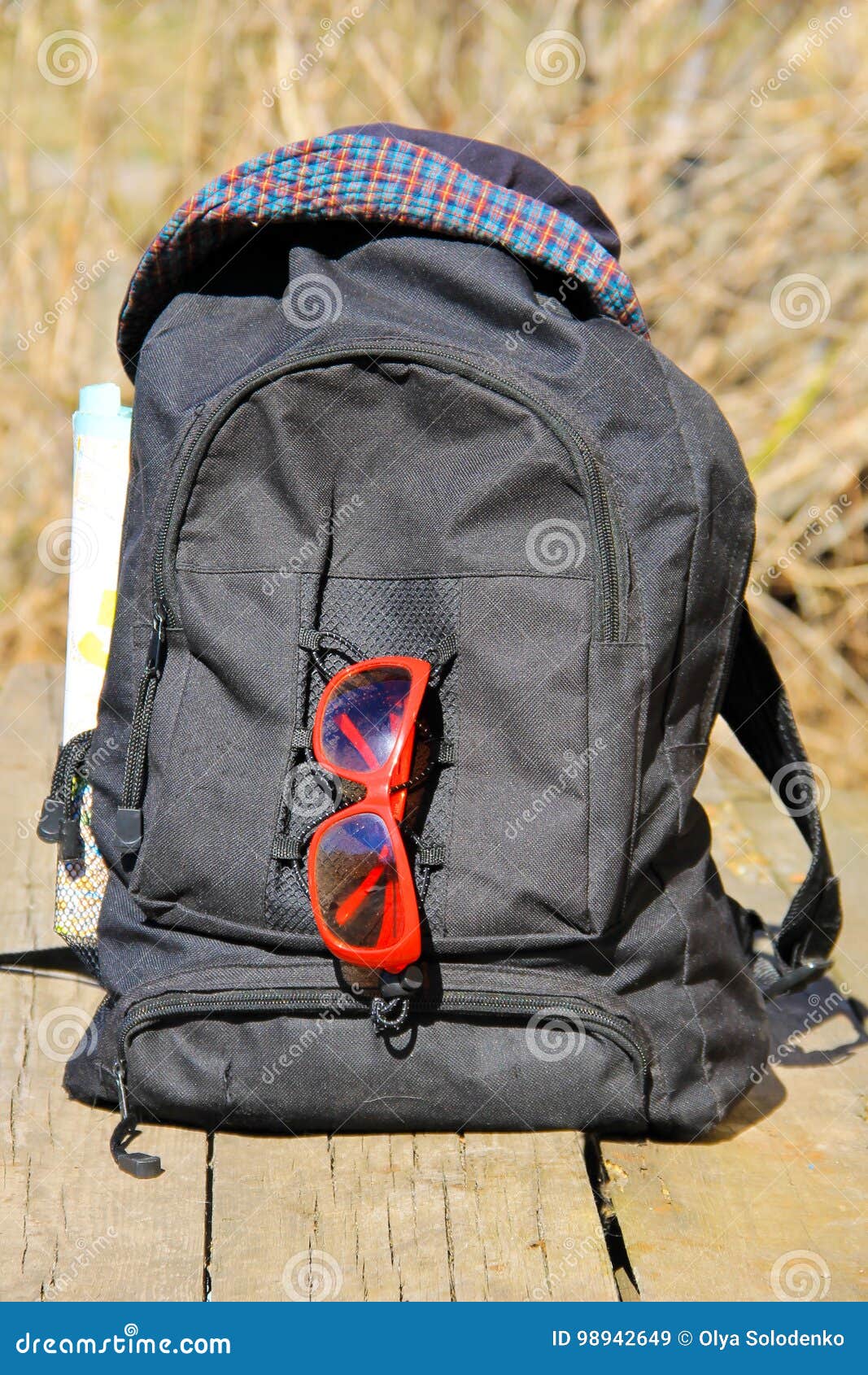 Backpack with Hat, Red Sunglasses and Map Stock Image Image of