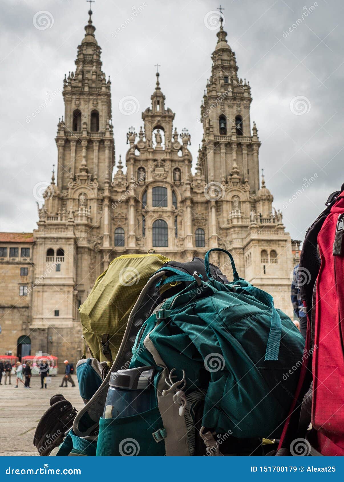 backpack of pilgrim with the santiago de compostela cathedral in the obradoiro square in santiago de compostela
