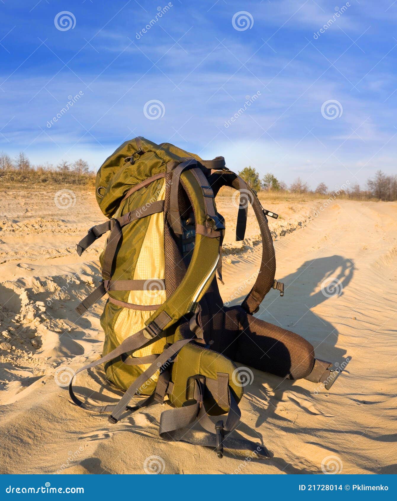 Backpack on sandy road stock photo. Image of sand, road 21728014