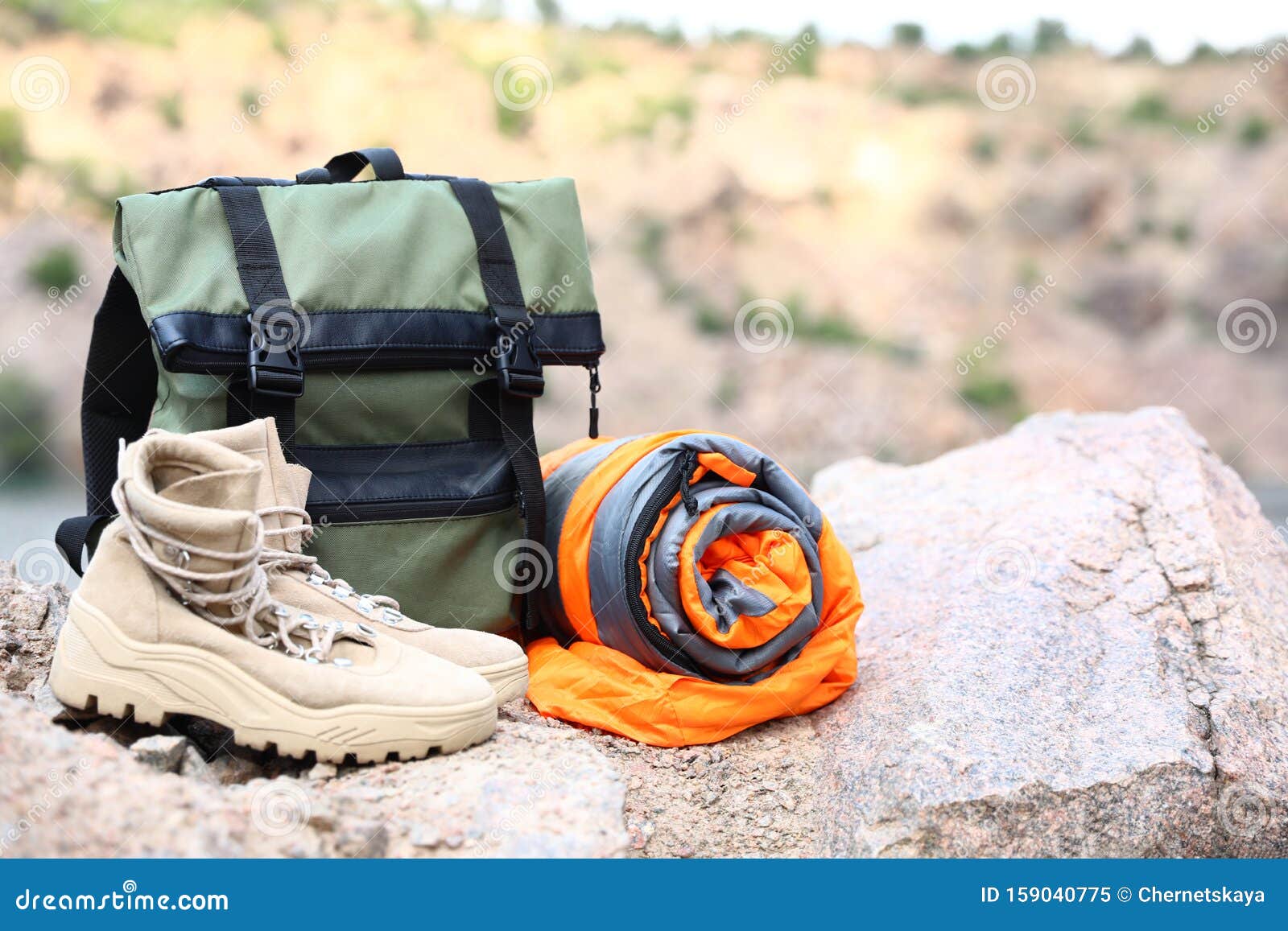 Backpack with Sleeping Bag and Boots on Sunny Day. Space for Text Stock