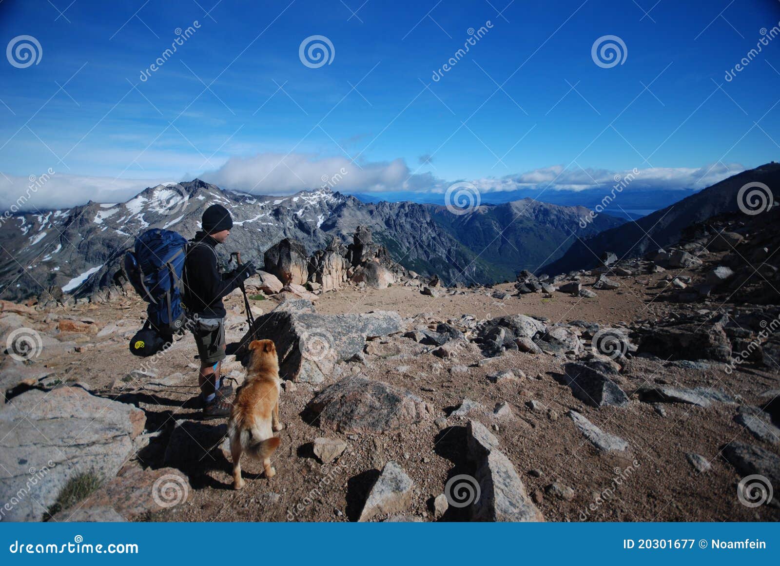 backpacker and a dog in the outdoors