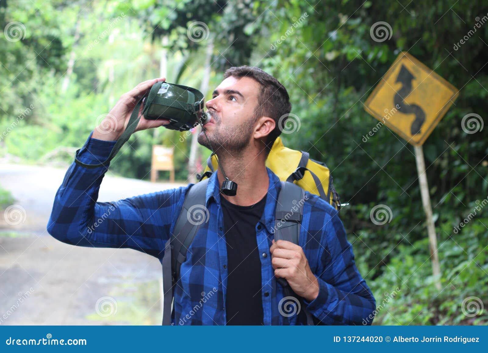 Backpacker Drinking Water from Metallic Canteen Stock Photo Image of