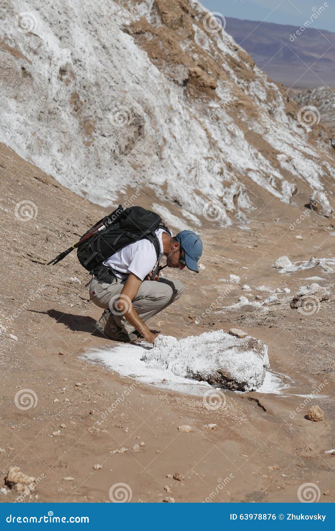 Backpacker Exploring the Moon Valley in Atacama Desert, Chile Editorial