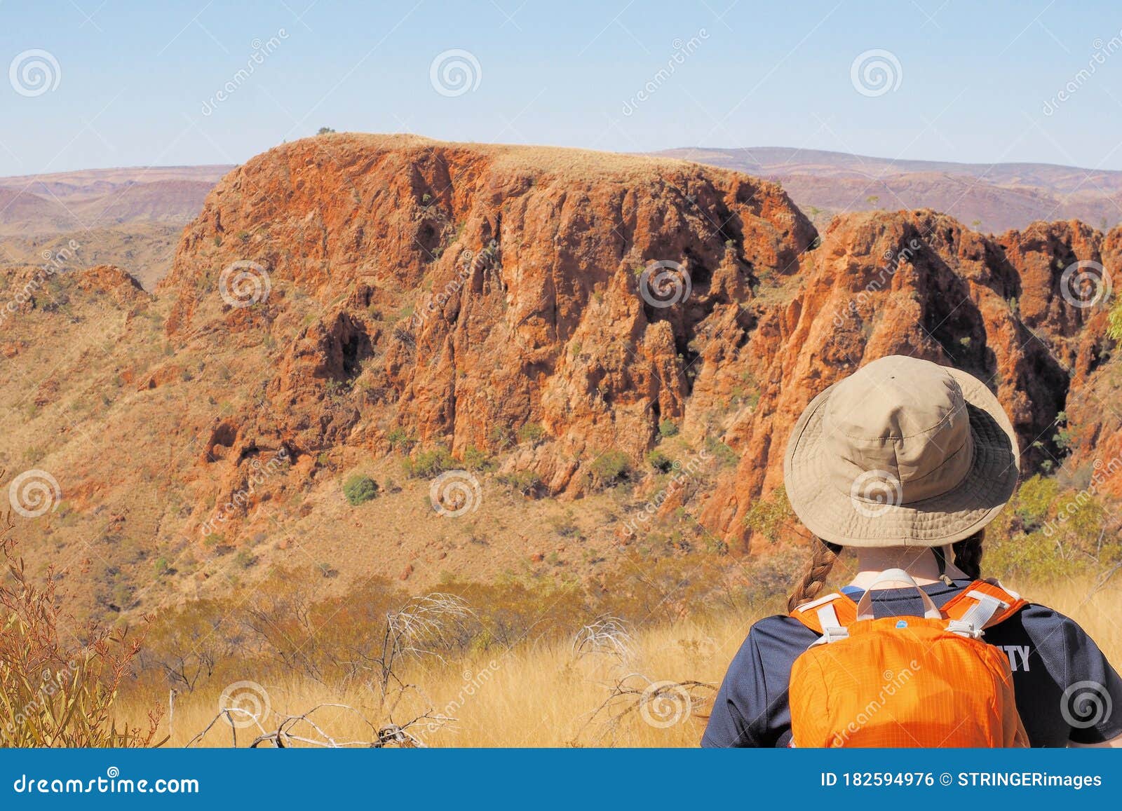 Backpacker Looking Out Over Cliffs at Trephina Northern