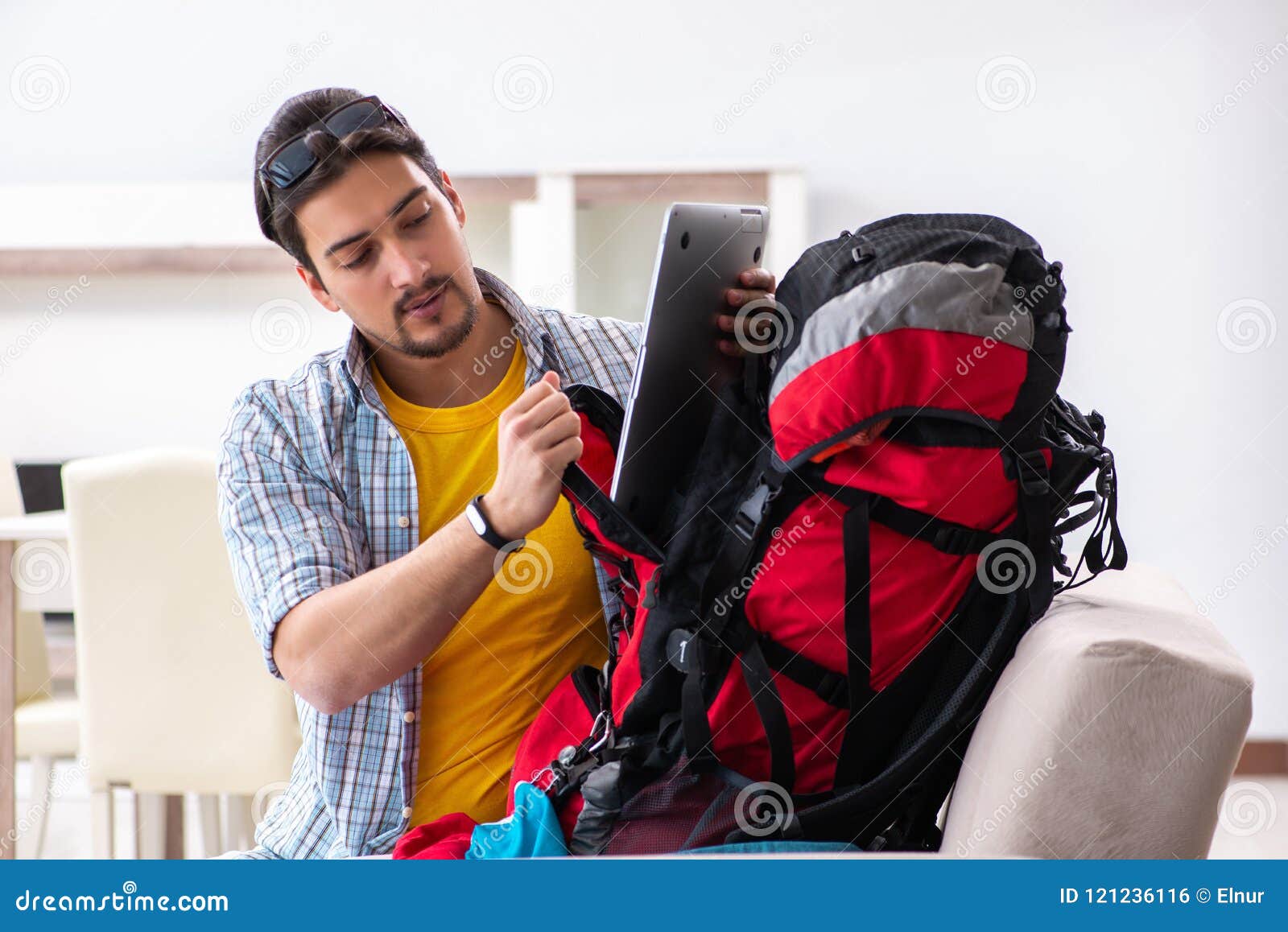 The Backpacker Packing for His Trip Stock Photo - Image of rucksack ...