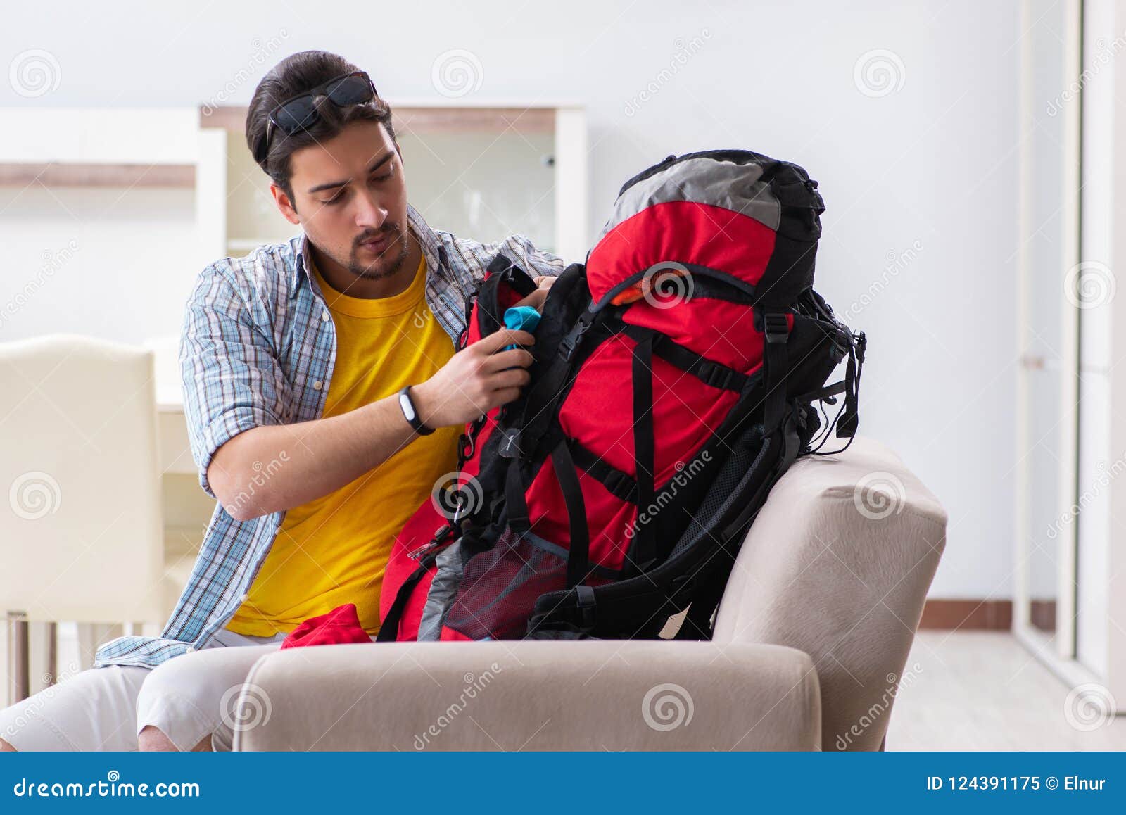 The Backpacker Packing for His Trip Stock Image Image of hiking