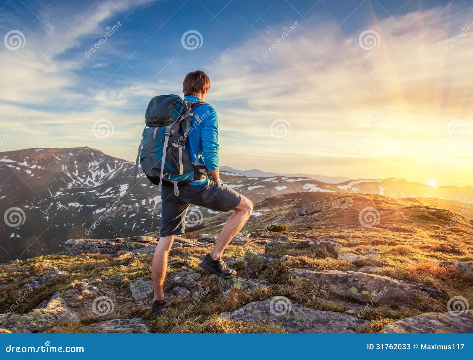 backpacker on top of a mountaine