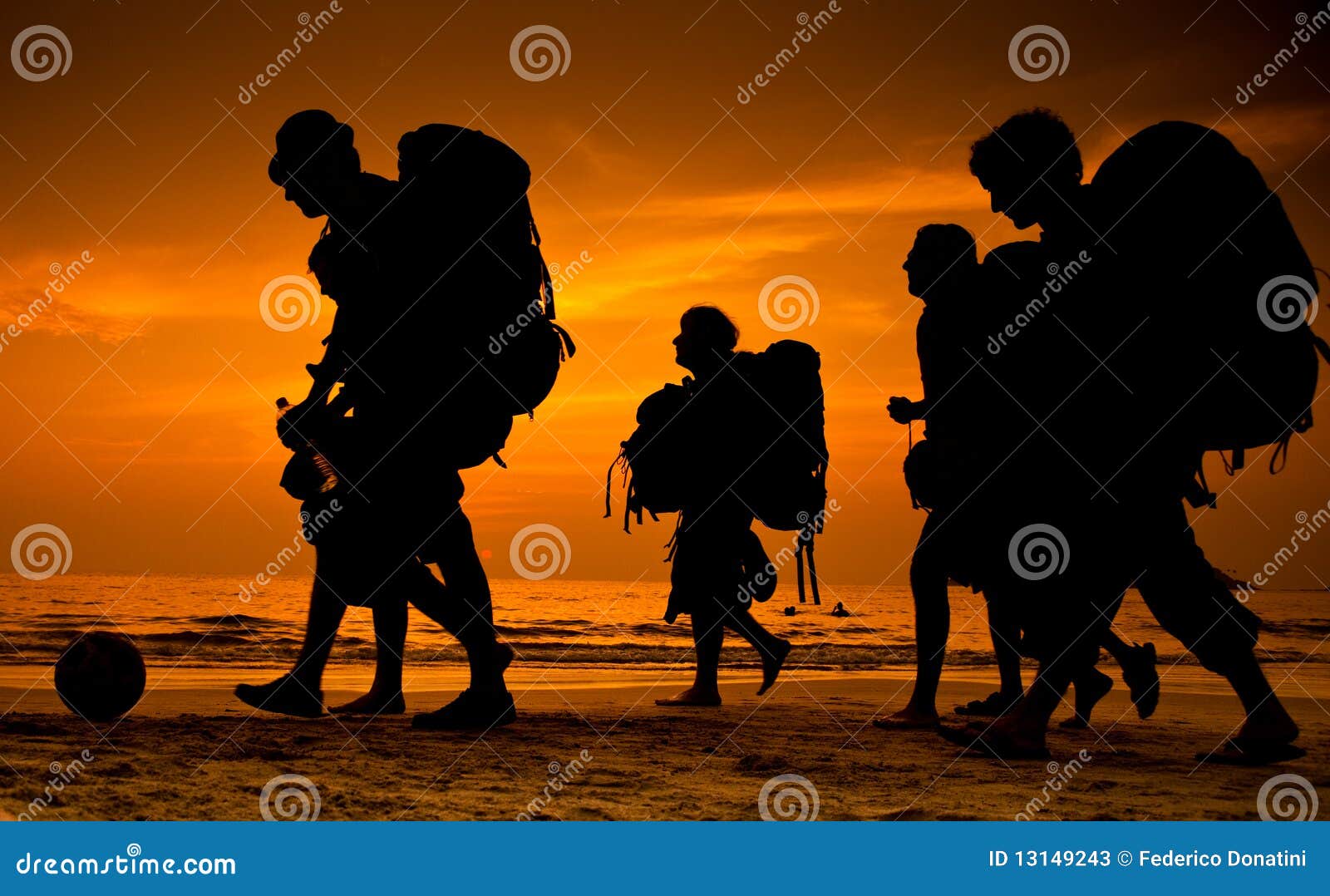 backpackers on the beach