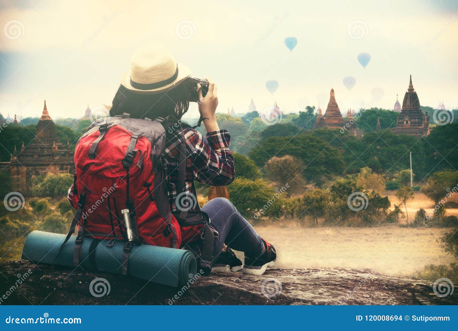 backpacking woman traveller and photographing in bagan mandalay