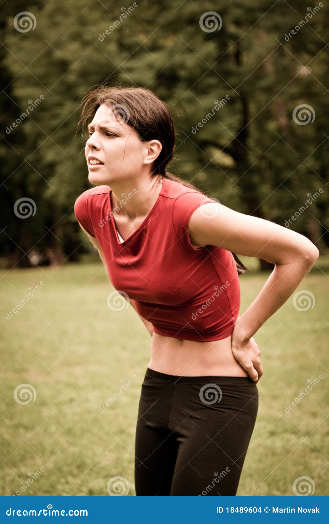 Backpain Sportswoman in Pain Stock Photo Image of muscle, cramped