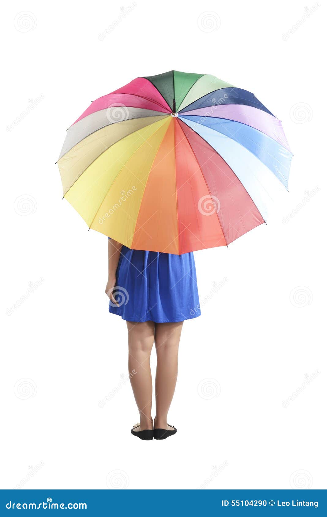 backview of woman holding colorful umbrella