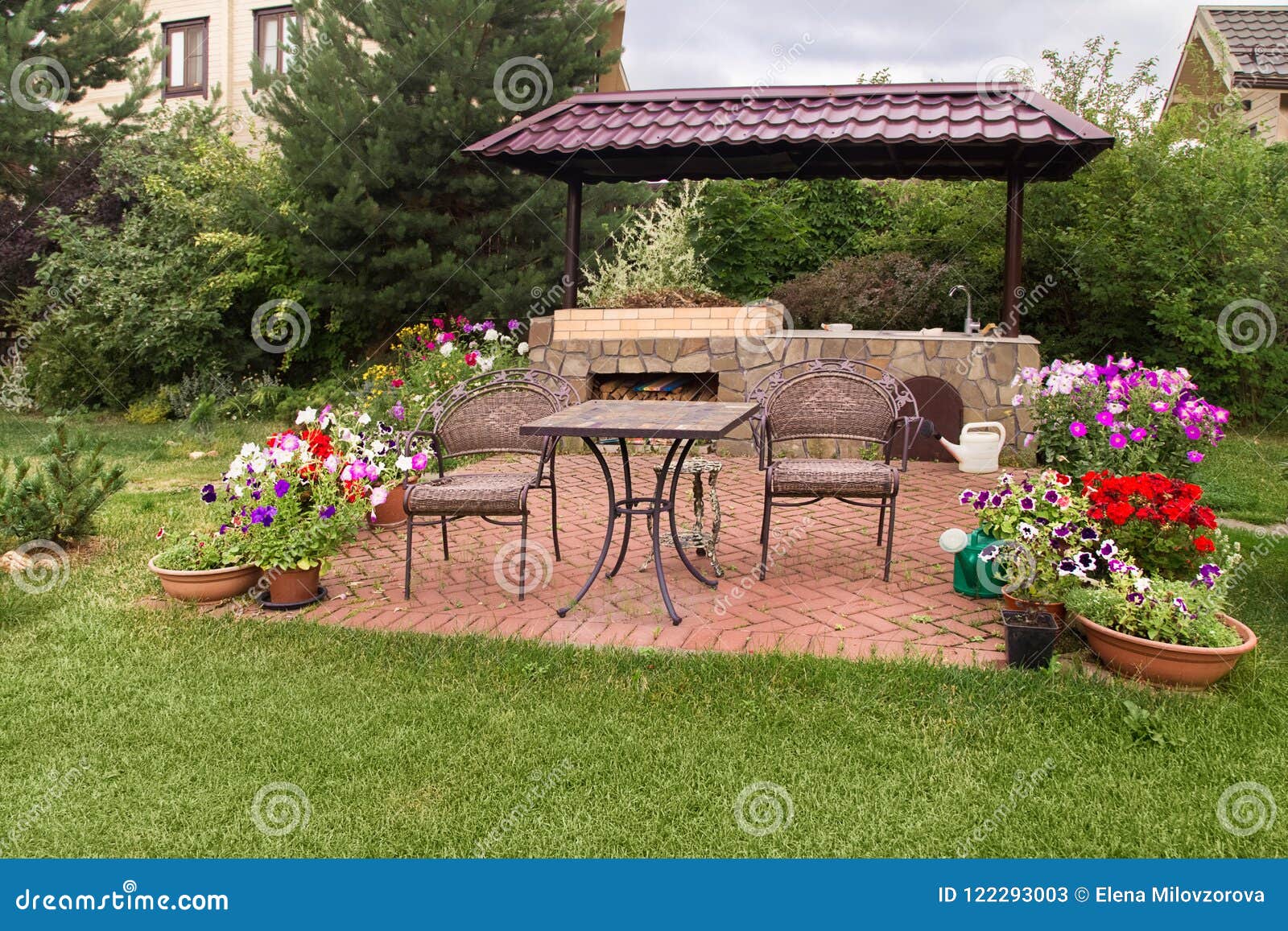 Backyard Patio Area With Stone Fireplace Stock Image Image Of Modern Chairs 122293003