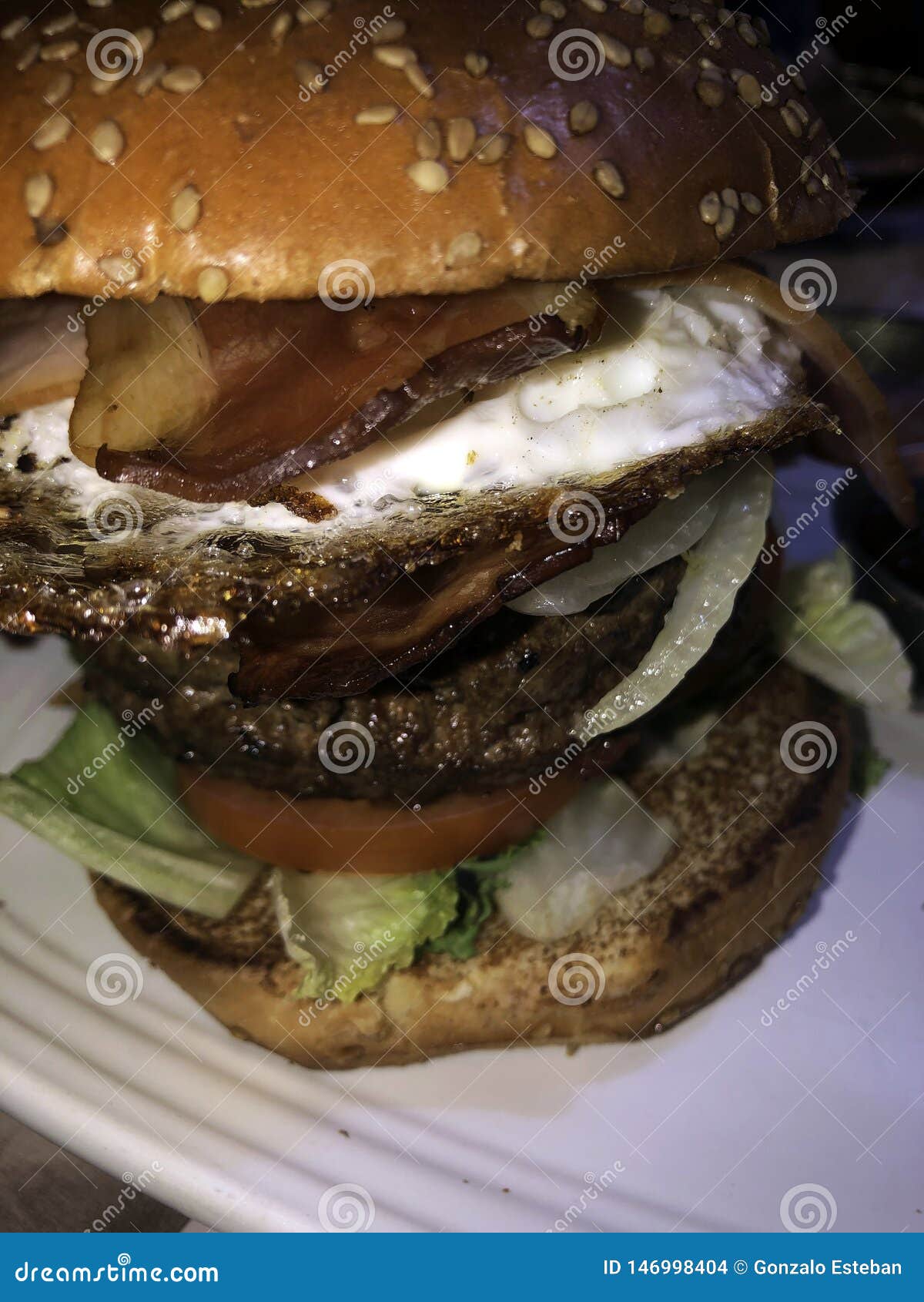 Bacon egg burger stock photo. Image of onion, eating - 146998404