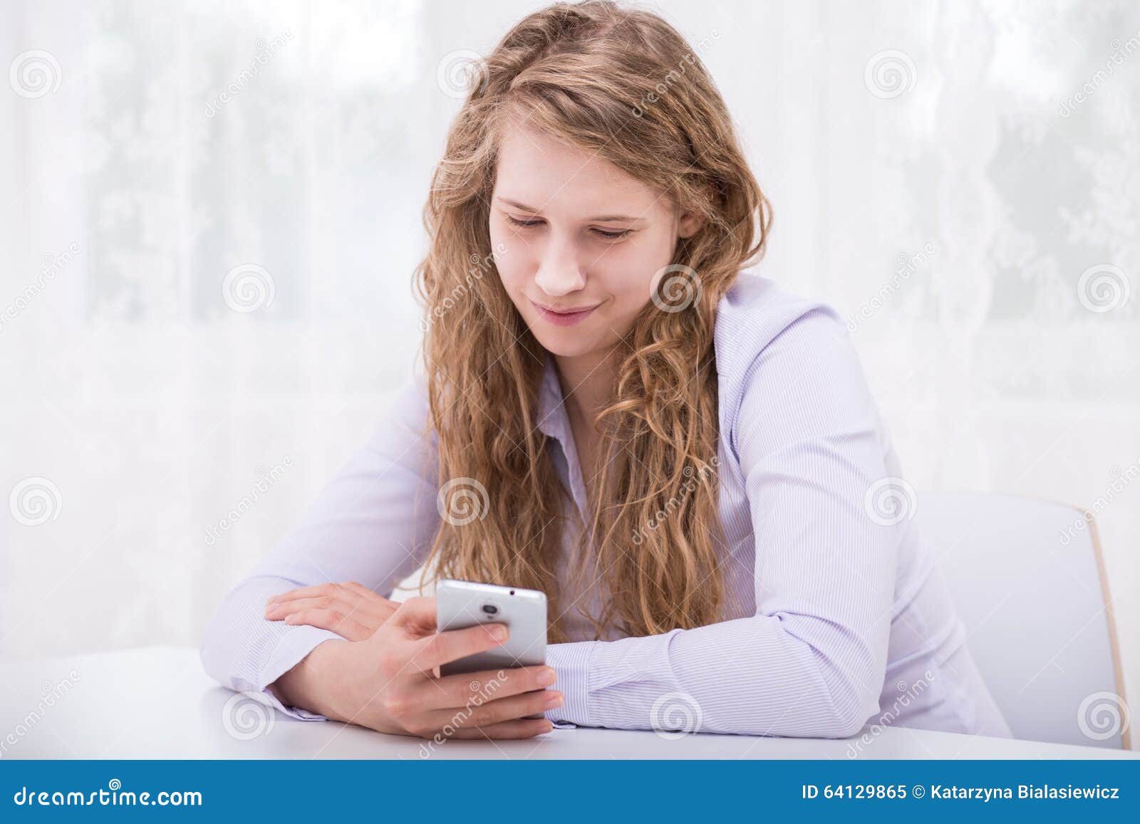 Photo of bad girl sending abusive message to her classmate