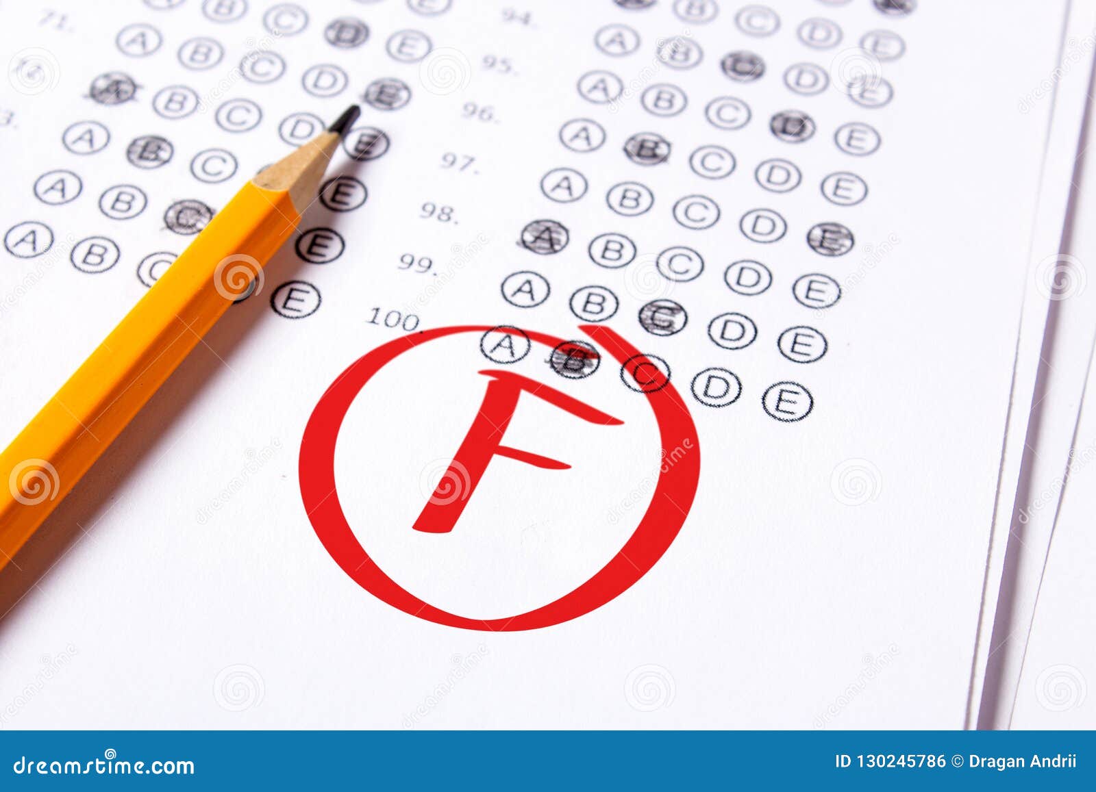 bad grade f is written with red pen on the tests