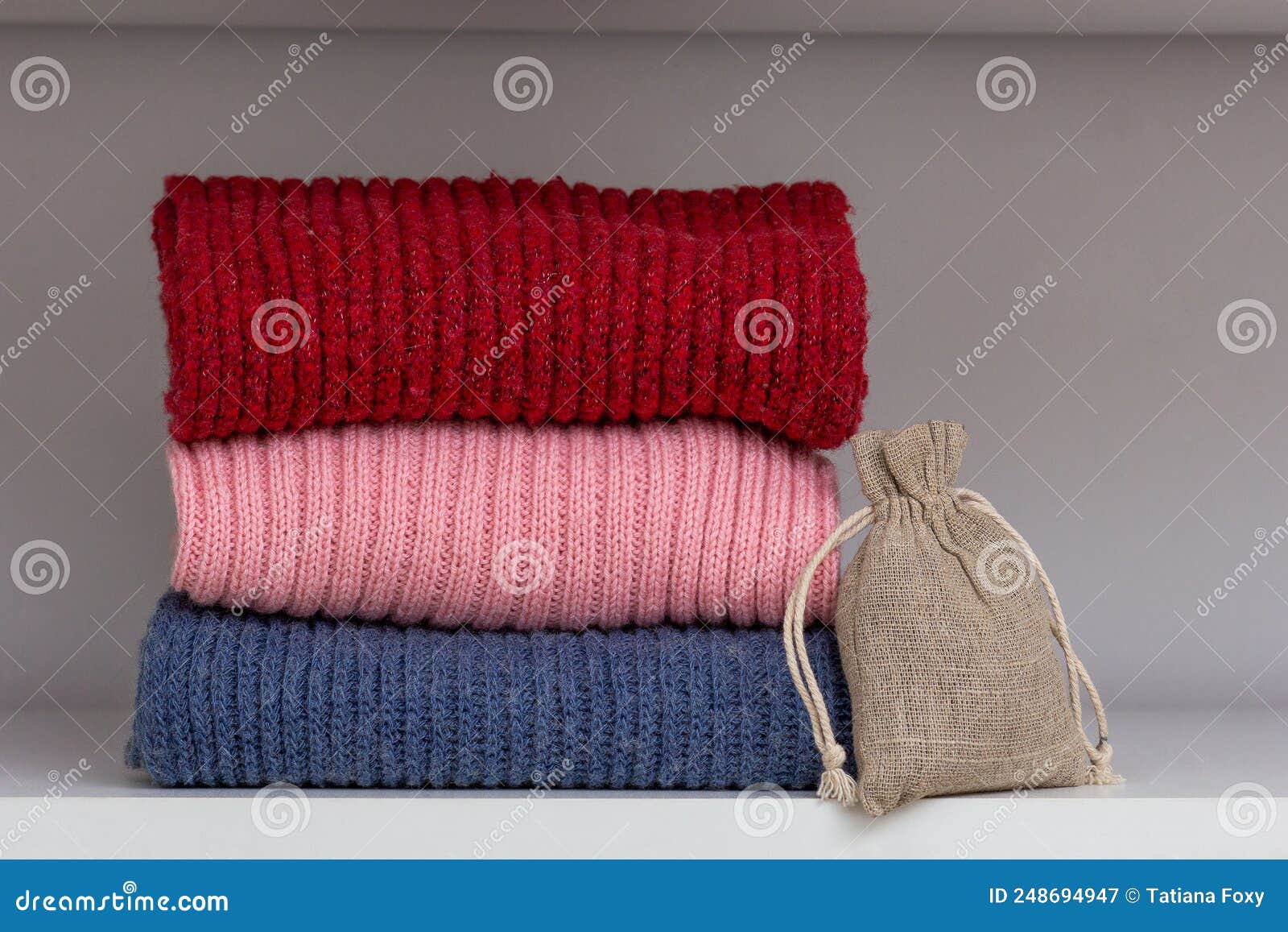Lavender sachet in a woolen jacket pocket in a closet, moth repellent Stock  Photo - Alamy