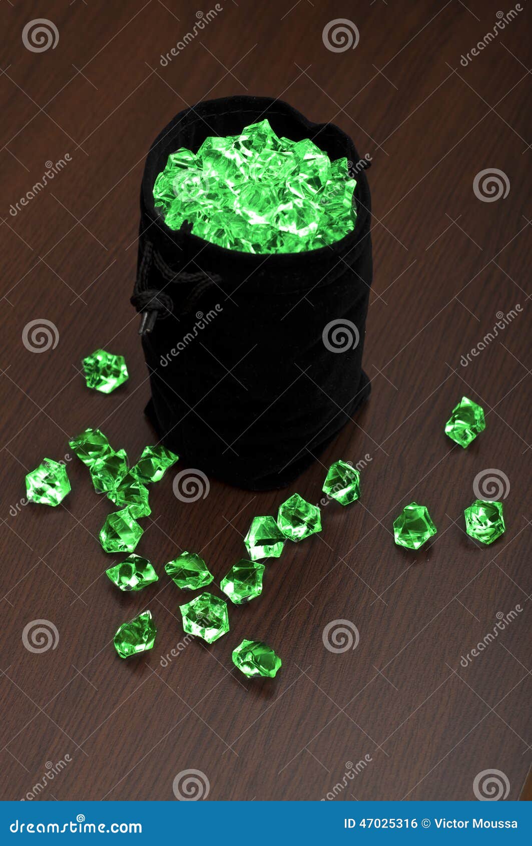 Bag of emeralds stock photo. Image of black, rich, green 47025316