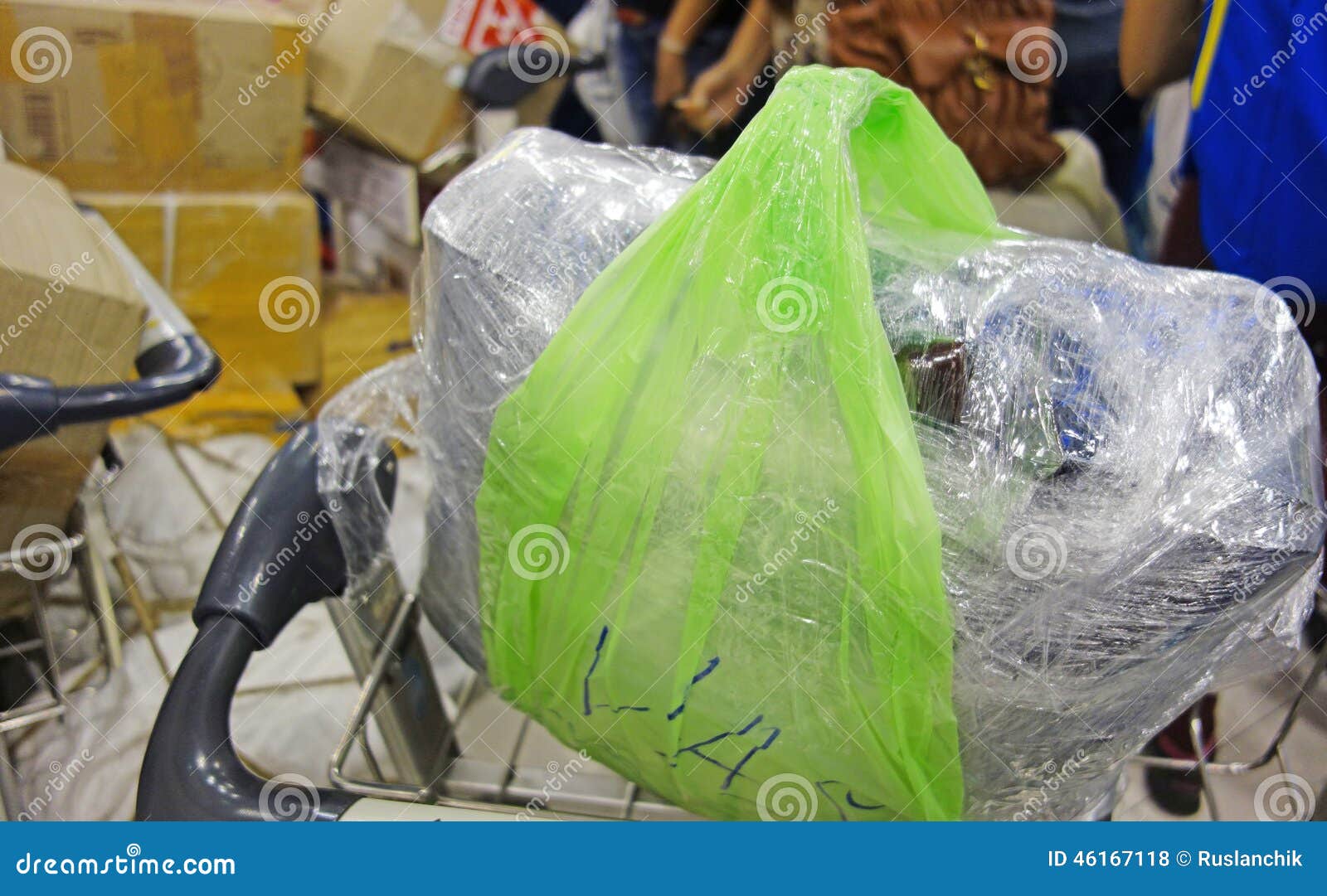Bag in hand cart stock photo. Image of business, bags 46167118