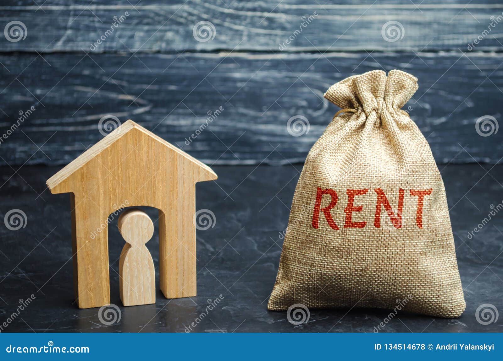 A Bag With Money And The Word Rent And A House With A Tenant Inside. The Accumulation Of Money ...