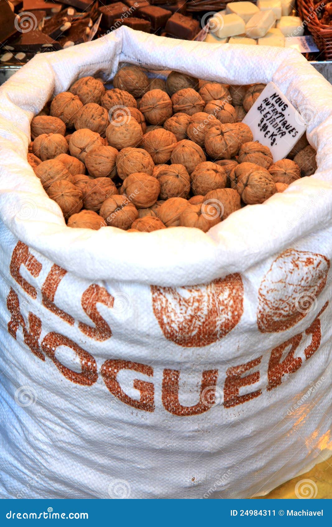 Bag of walnuts in a market stock image. Image of walnut 24984311