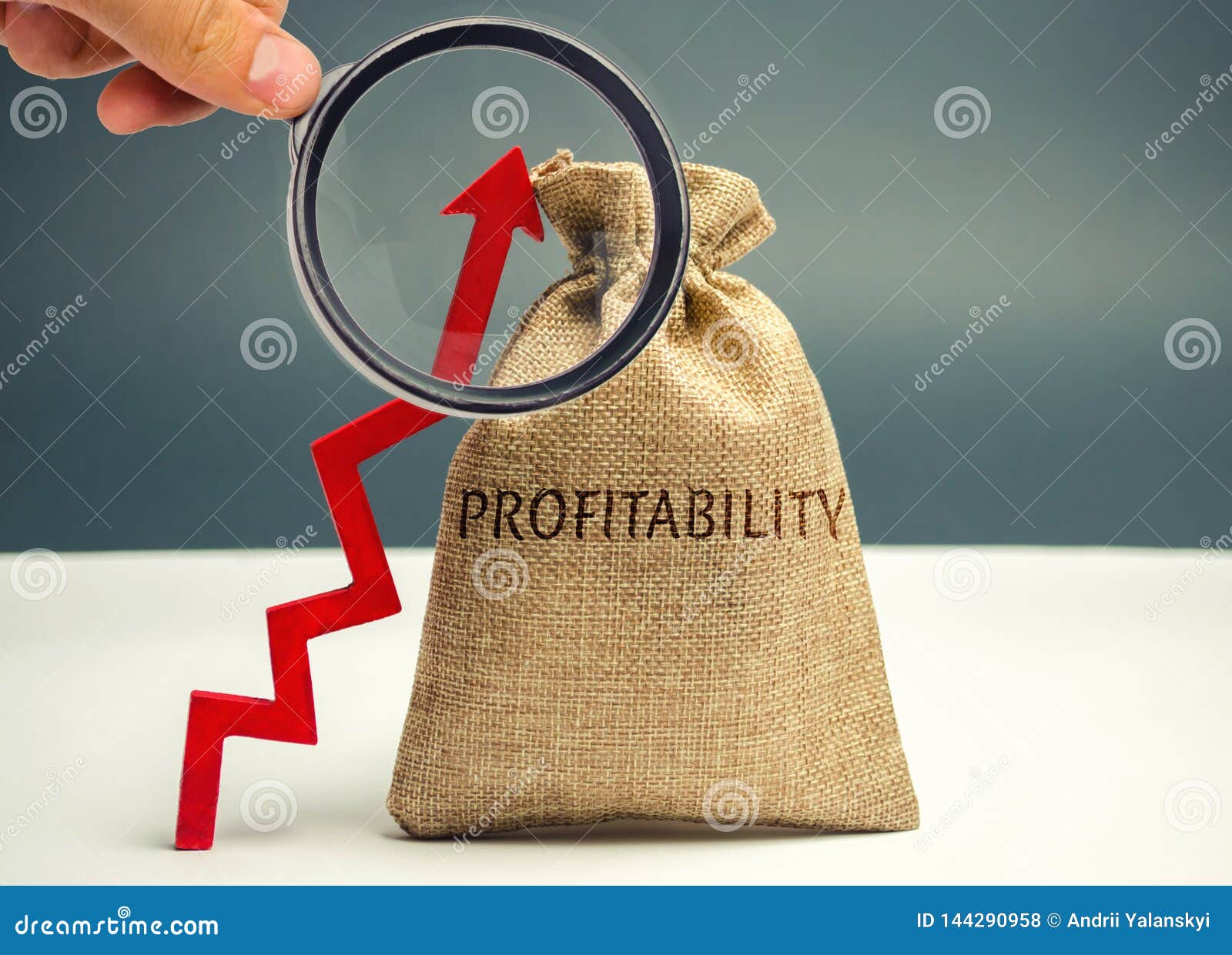 bag with the word profitability and an up arrow. high economic efficiency and profitableness. business development assessment. the