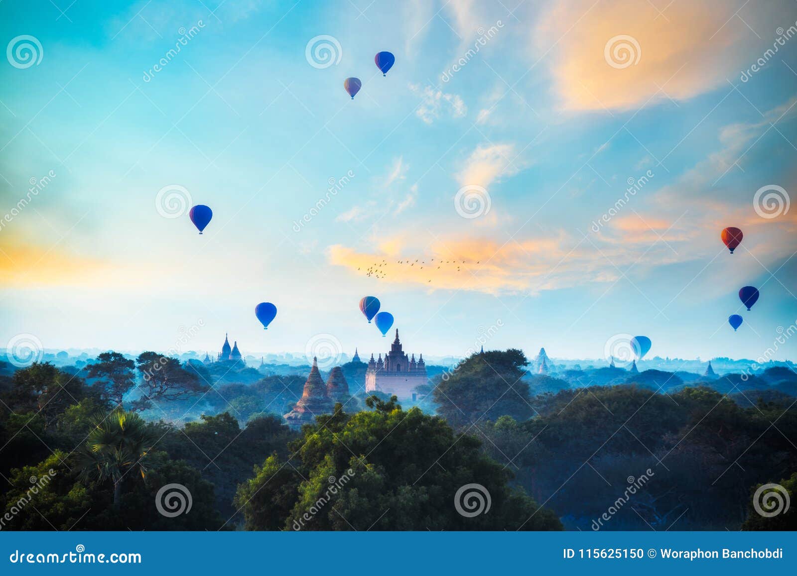 Hot air balloon over plain of bagan in misty morning, Mandalay Myanmar